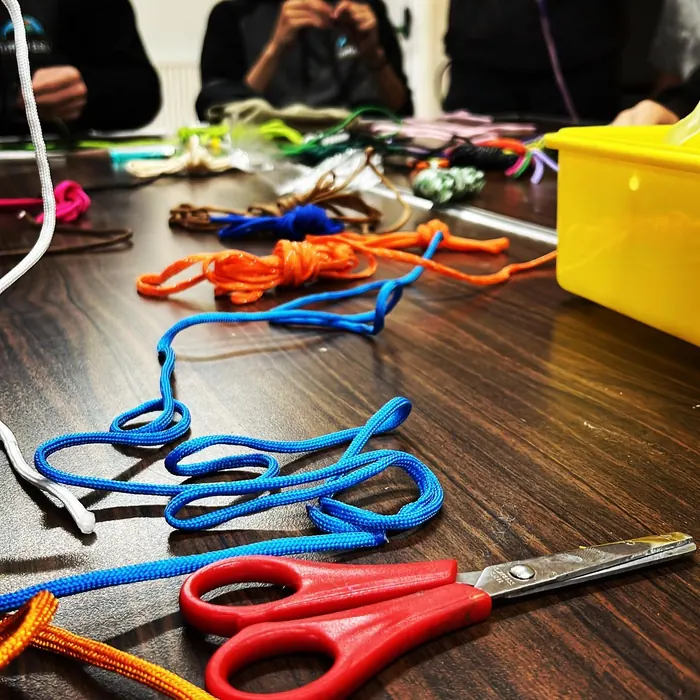 Explorers working on a craft activity at the hut